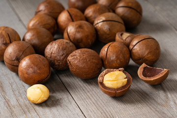 macadamia nuts on wooden table