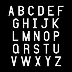 White alphabet letters on black background
