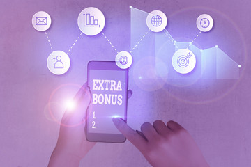Handwriting text writing Extra Bonus. Conceptual photo an extra amount of money that is added to...