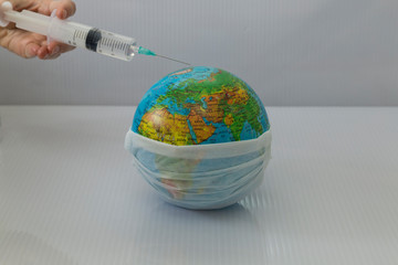 earth globe and injector. Precautions for corona virus