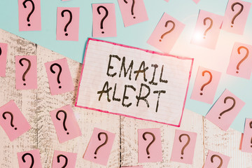 Handwriting text Email Alert. Conceptual photo emails auto generated nd sent to designated recipients Scribbled and crumbling papers with thick cardboard above wooden table