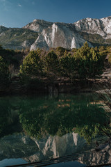 lake at the foot of the mountain , beautiful Alpine views, water, sky, plants