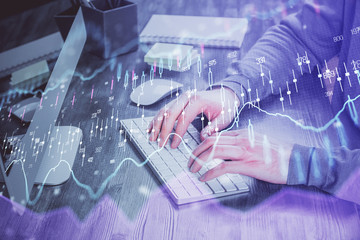 Double exposure of financial graph with man works in office on background. Concept of analysis.