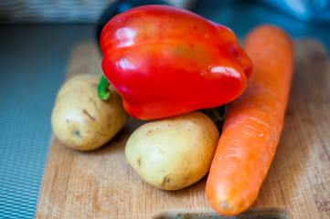 fresh vegetables on wooden table