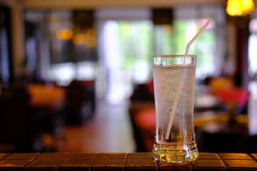 glass of water on wood counter background