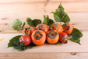 Persimmons on table