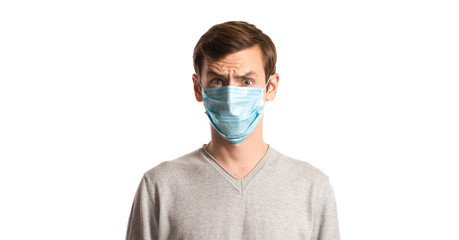 portrait of a guy in a disposable mask on a white background