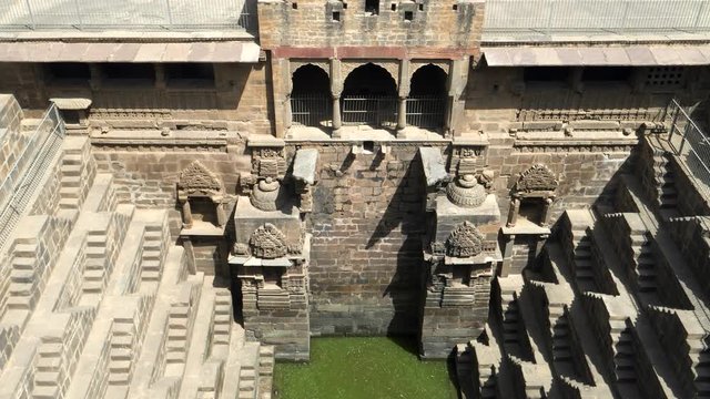 zoom in on water at chand baori, a stepwell situated in the village of abhaneri in the indian state of rajasthan