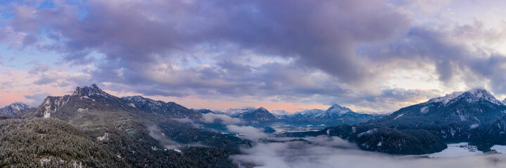 austrian mountain alps with beautiful sky cloud mood and ground fog at autumn