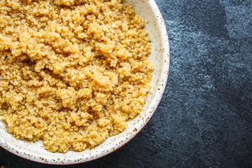 Cooked quinoa, boiled cereal porridge (healthy diet eating) menu concept background. top view. copy space for text