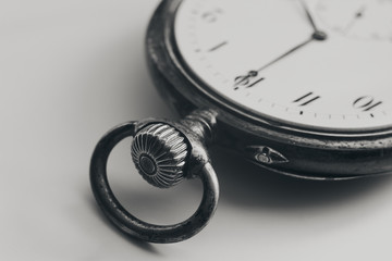 Close Up silver old pocket watch. Vintage timepiece. Antique concept. Black and white images.