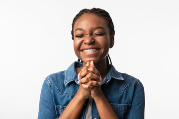 Black Girl Begging Making Pleading Gesture Posing Over White Background