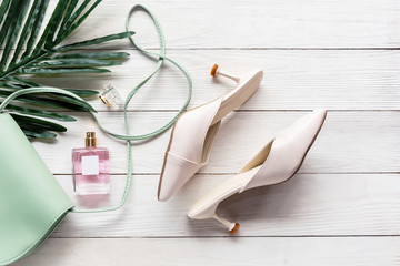 Fashion bag and shoe woman accessories background. Trendy fashion luxury handbag , heels shoe,...