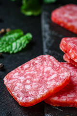 salami (meat product sausage) menu concept background. top view. copy spaces