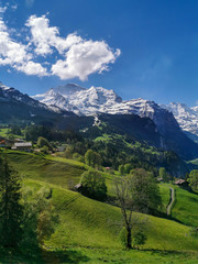 Fototapeta premium Panoramic view of Lauterbrunnen, the Staubbach fall and the Lauterbrunnen Wall.