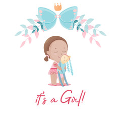 Cute girl in the tutu pask hugs her stitched rabbit toy