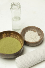 Making homemade green clay facial beauty mask	