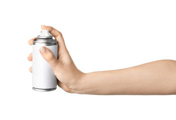 Woman holds spray can in hands isolated on white background