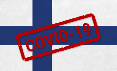 Flag of Finland on paper texture with stamp, banner of Coronavirus name on it. 2019 - 2020 Novel Coronavirus (2019-nCoV) concept, for an outbreak occurs in the Finland.