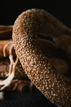 Macro Bread Pretzel and Bagel on a wooden table