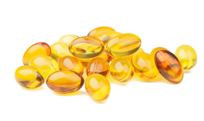 Omega 3 fish oil capsules on  the White Surface. Closeup