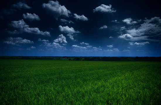 Dark  Stormy Sky And Green Field - Natural Summer Landscape