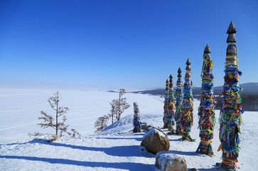 Ritual Buryat pillars on cape Shamanka, Olkhon Island in Lake Baikal