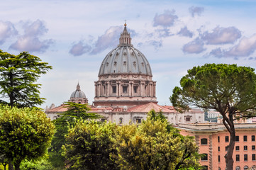 Fototapeta premium St. Peter's Basilica dome and Vatican gardens, center of Rome, Italy