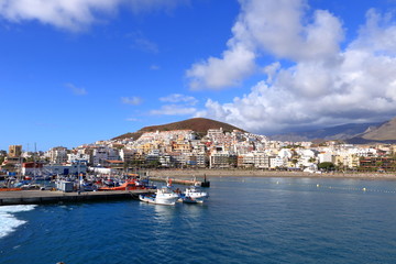 Fototapeta na wymiar Town and port of Los Cristianos of the southern part of Tenerife in the Spanish Canary Islands
