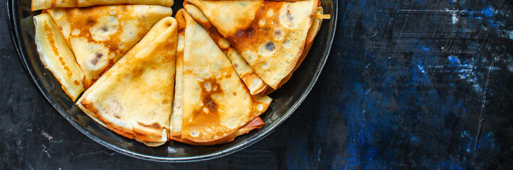 crepes Tasty dessert (thin pancakes, healthy breakfast) menu concept. background. top view. copy space for text