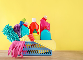 Cleaning product plastic container for house clean on table and yellow background