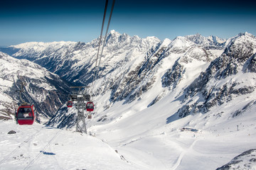 Fototapeta na wymiar ski lift in high mountain