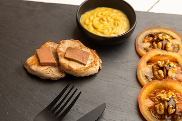 Pork tenderloin dish with pate and tomato and walnut salad