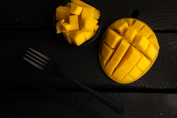 delicious mango fruit cut into squares