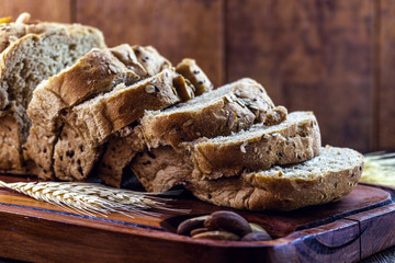 homemade bread, made from Brazil nuts and walnuts, with oats and flaxseed. Export product, Brazilian cuisine. Bottom wooden table, healthy cooking concept.