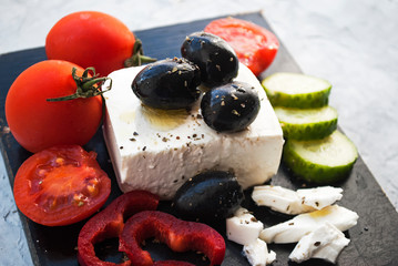 Fresh Greek Feta Cheese. Healthy ingredient for cooking salad. Goat feta cheese with herbs.