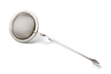 Tea strainer closeup on a white background, isolate
