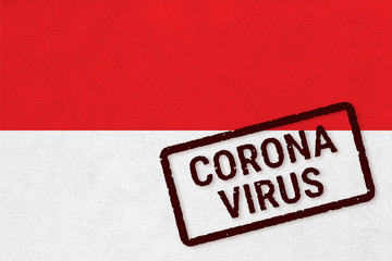 Flag of Indonesia on paper texture with stamp, banner of Coronavirus name on it. 2019 - 2020 Novel Coronavirus (2019-nCoV) concept, for an outbreak occurs in the Indonesia.