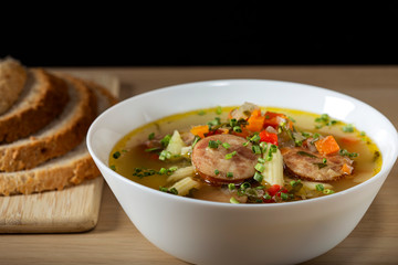 Soup with sausage, vegetables and pasta