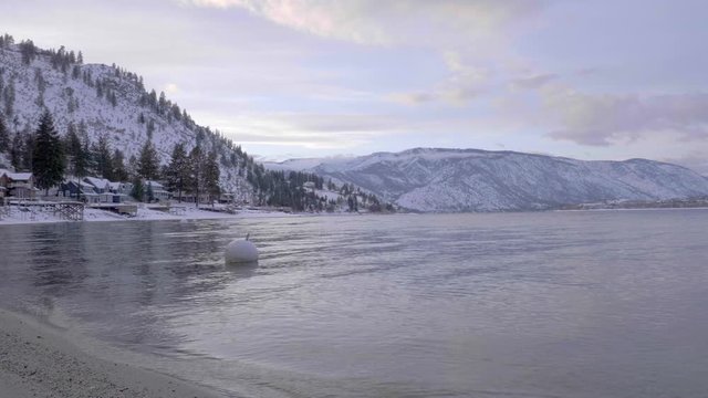 Lake Chelan in Washington state during the winter with everything snowed.
