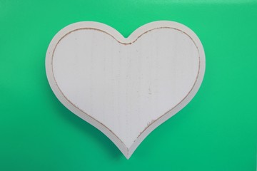 a beautiful white wooden heart