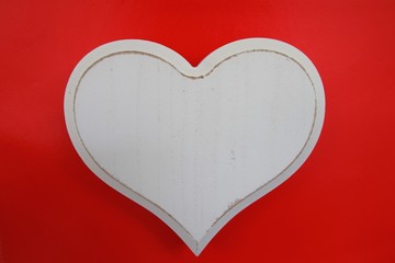 a beautiful white wooden heart
