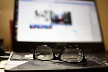 glasses on laptop
