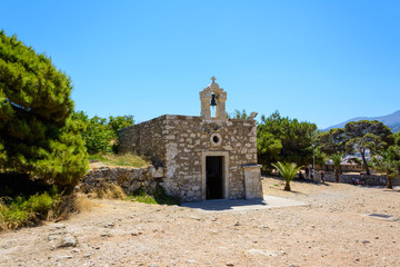 Fototapeta na wymiar Rethymno, fortress of Fortezza. small stone Church of Saint Catherine on the territory.