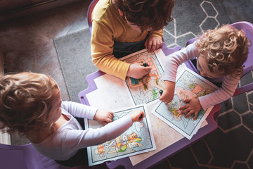 Children doing homework at home