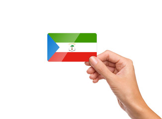 Beautiful hand holding Equatorial Guinea flag card on white background