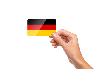 Beautiful hand holding Germany flag card on white background