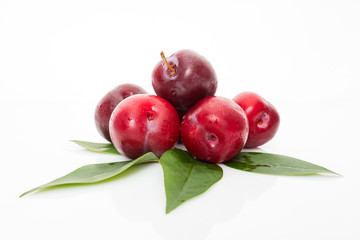 fresh plum isolated on white background