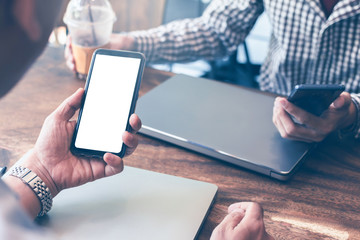 Newsletter concept hand of asian man checking message box on digital mobile phone  mock up blank copy white space for your text .