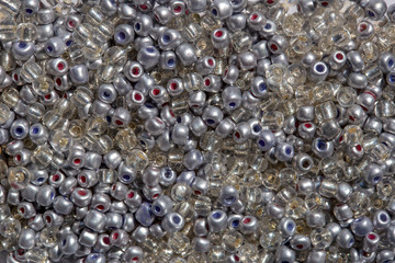 Macro photography of some colorful beads of different shape used for manufacturing jewerly and accesories.